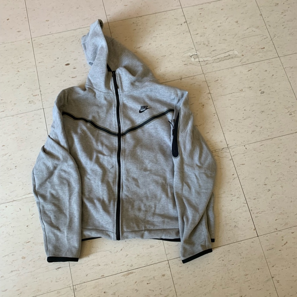 Grey Nike tech sweater large for men.